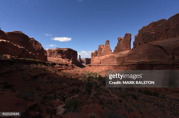 View of the Park Avenue trail in the Arches National Park near Moab, Utah on April 21, 2018. - The park which has over 2000 arches that were formed...