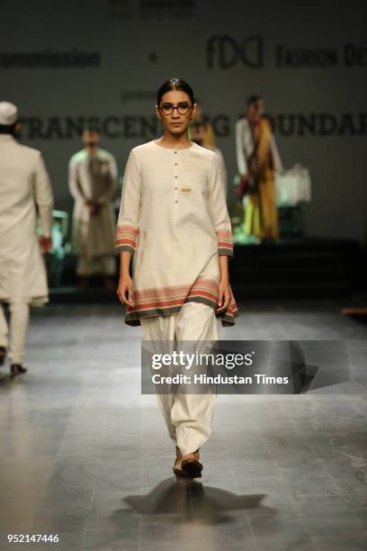 Model walks on the ramp during the event, "Khadi - Transcending Boundaries." It included a fashion show by designers Anju Modi, Poonam Bhagat, Payal...