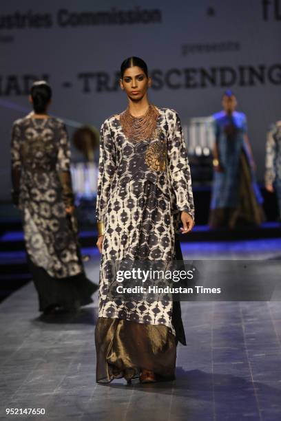 Model walks on the ramp during the event, "Khadi - Transcending Boundaries." It included a fashion show by designers Anju Modi, Poonam Bhagat, Payal...