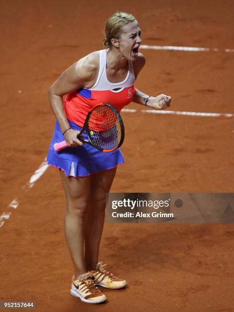 Anastasia Pavlyuchenkova of Russia celebrates winning the second set during her match against Anett Kontaveit of Estonia during day 5 of the Porsche...