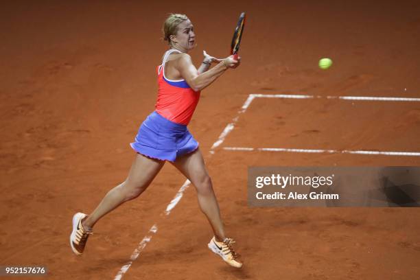 Anastasia Pavlyuchenkova of Russia plays a forehand to Anett Kontaveit of Estonia during day 5 of the Porsche Tennis Grand Prix at Porsche-Arena on...