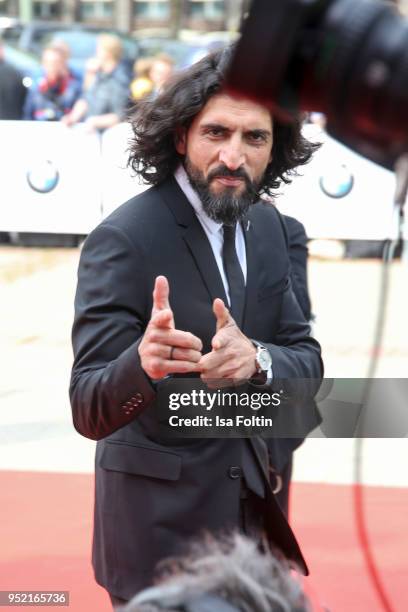 Actor Numan Acar attends the Lola - German Film Award red carpet at Messe Berlin on April 27, 2018 in Berlin, Germany.