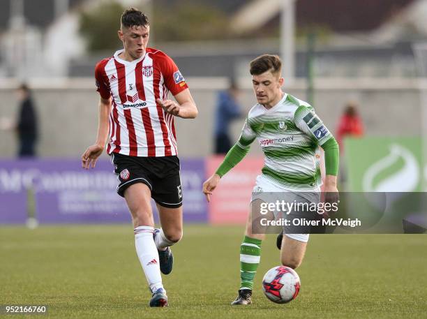 Derry , United Kingdom - 27 April 2018; Eoin Toal of Derry City in action against Aaron Bolger of Shamrock Rovers during the SSE Airtricity League...