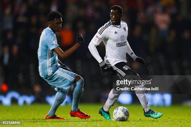 Aboubakar Kamara of Fulham FC competes for the ball with Ovie Ejaria of Sunderland during the Sky Bet Championship match between Fulham and...