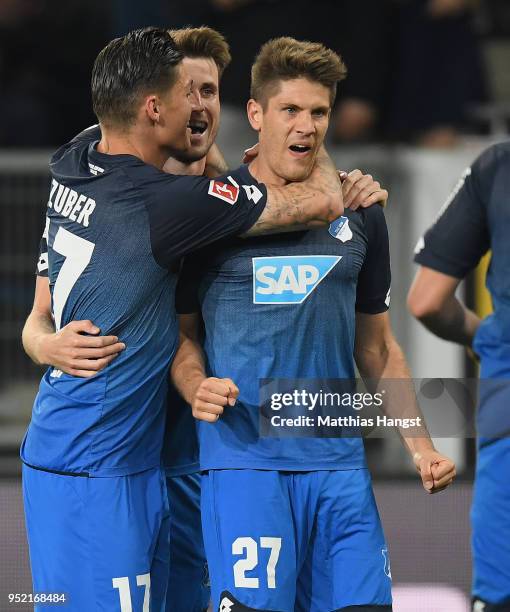 Andrej Kramaric of Hoffenheim celebrates with his team-mates after scoring his team's second goal during the Bundesliga match between TSG 1899...