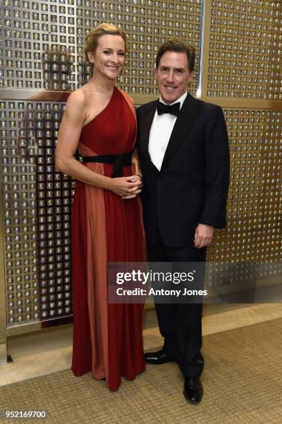 Gabby Logan and Rob Brydon attend the British Airways golf day and gala ball at The Grove on April 27, 2018 in London, England.