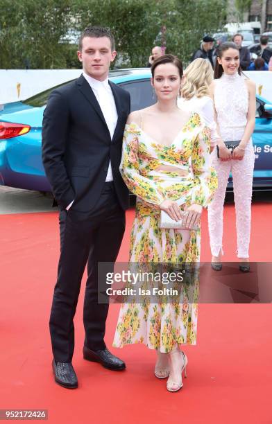 German actors Jannis Niewoehner and Emilia Schuele attend the Lola - German Film Award red carpet at Messe Berlin on April 27, 2018 in Berlin,...