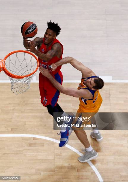 Will Clyburn, #21 of CSKA Moscow competes with Sergey Monia, #12 of Khimki Moscow Region in action during the Turkish Airlines Euroleague Play Offs...