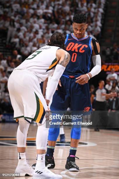 Russell Westbrook of the Oklahoma City Thunder looks on while guarded by Ricky Rubio of the Utah Jazz in Game Four of Round One of the 2018 NBA...