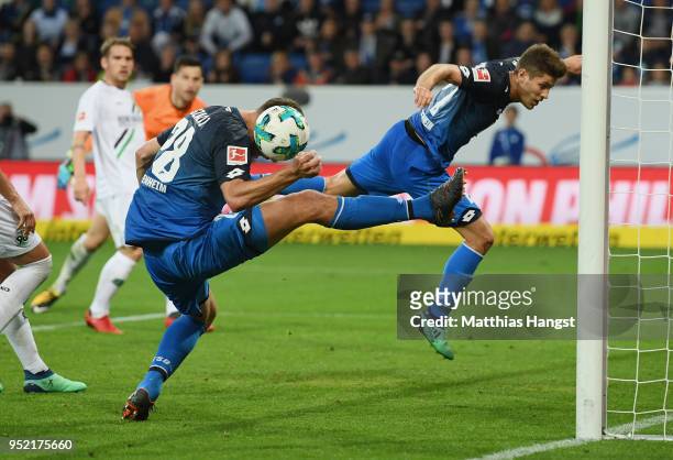 Adam Szalai of Hoffenheim and Steven Zuber of Hoffenheim miss to score during the Bundesliga match between TSG 1899 Hoffenheim and Hannover 96 at...