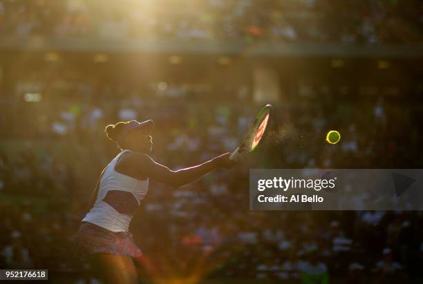 Venus Williams plays a shot against Natalia Vikhlyantseva of Russia during Day 5 of the Miami Open at the Crandon Park Tennis Center on March 23,...