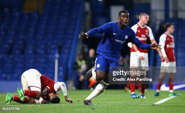 Marc Guehi of Chelsea celebrates after he scores his sides second goal during the FA Youth Cup Final first leg match between Chelsea and Arsenal at...