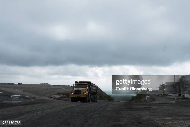 Truck drives towards the entrance of the Negociacion Minera Santa Maria de la Paz y Anexas SA silver mine in the town of Villa de La Pas, Matehuala,...