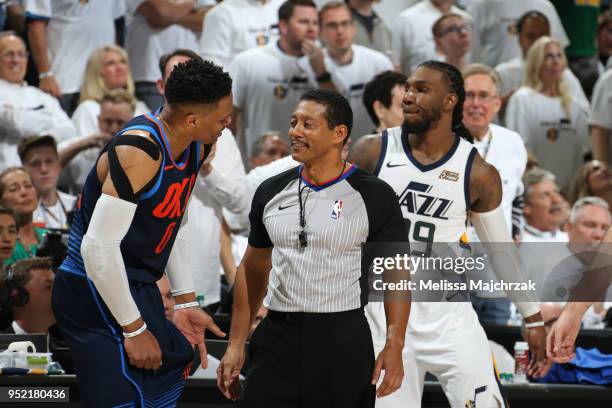 Russell Westbrook of the Oklahoma City Thunder talks with referee Bill Kennedy during Game Four of Round One of the 2018 NBA Playoffs against the...