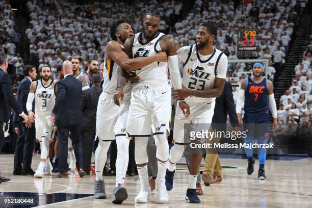 Donovan Mitchell Jae Crowder and Royce O'Neale of the Utah Jazz exchange a hug during Game Four of Round One of the 2018 NBA Playoffs against the...