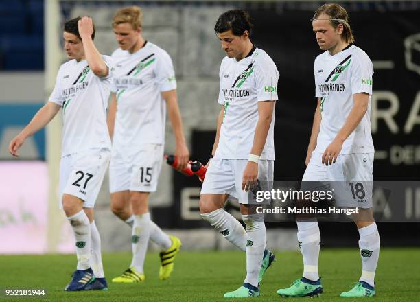 Pirmin Schwegler, Timo Huebers, Miiko Albornoz and Iver Fossum of Hannover show their disappointment after the Bundesliga match between TSG 1899...