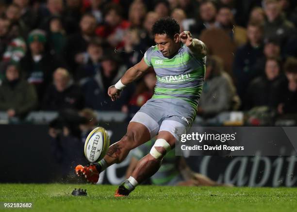 Sonatane Takulua of Newcastle Falcons successfully converts a try by team mate Ally Hogg to win the match win the last kick of the match during the...