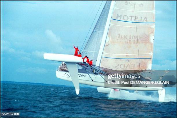 Skipper Alain Thebault waving.