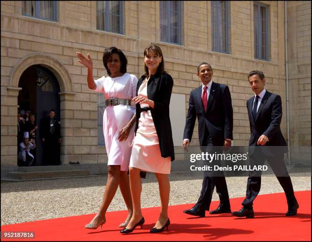 Les présidents Barack Obama et Nicolas Sarkozy accompagnés de leurs femmes respectives Carla Bruni Sarkozy et Michelle Obama à l'occasion des...