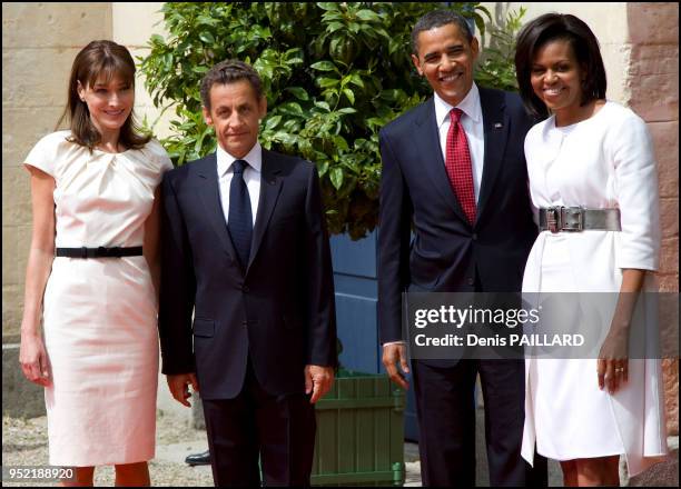 Les présidents Barack Obama et Nicolas Sarkozy accompagnés de leurs femmes respectives Carla Bruni Sarkozy et Michelle Obama à l'occasion des...