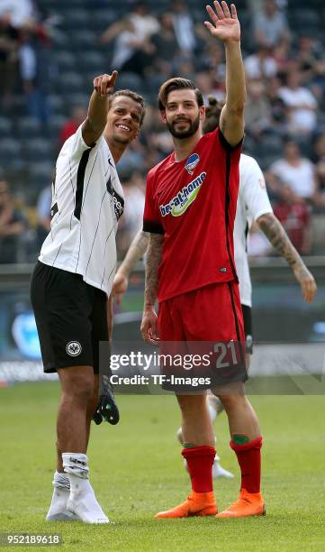 Timothy Chandler of Frankfurt and Marvin Plattenhardt of Hertha gesture during the Bundesliga match between Eintracht Frankfurt and Hertha BSC at...