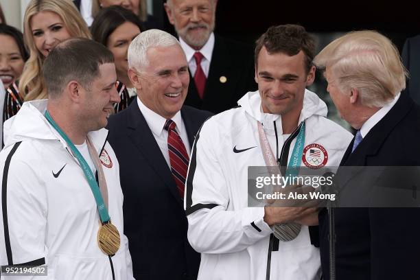 President Donald Trump greets freestyle skier Nick Goepper as he hosts Team USA at the North Portico of the White House April 27, 2018 in Washington,...