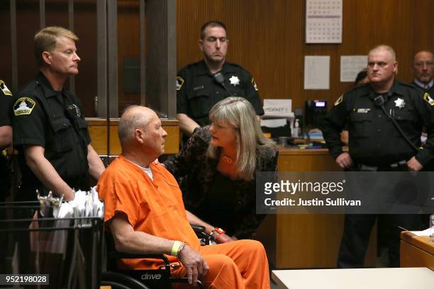 Joseph James DeAngelo, the suspected "Golden State Killer", talks with public defender Diane Howard as he appears in court for his arraignment on...