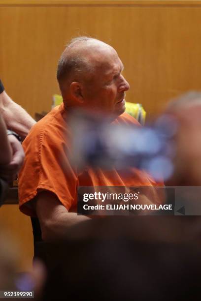 Joseph James DeAngelo is taken on a wheel chair into the courtroom to be arraigned on two counts of murder April 27 in Sacramento, California. -...