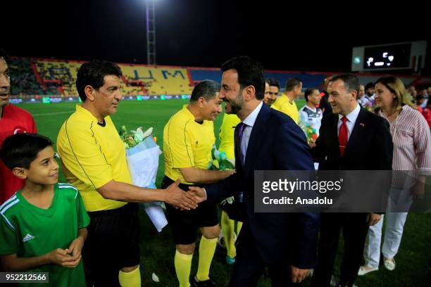 Iraqi Minister of Youth and Sports Abdul-Hussein Abtaan and Turkish Ambassador to Iraq Fatih Yildiz are seen during a friendly match between Turkey...