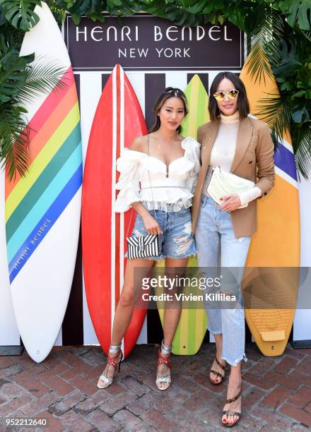 Jamie Chung and Louise Roe attend the Henri Bendel Surf Sport 2018 Collection Launch at The Bungalow on April 27, 2018 in Santa Monica, California.