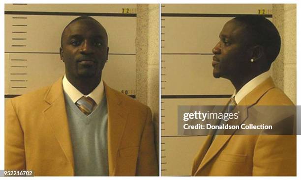 Aliaune Damala Thiam) opted for a preppy look when he posed for the above mug shot in upstate New York in December 2007 (