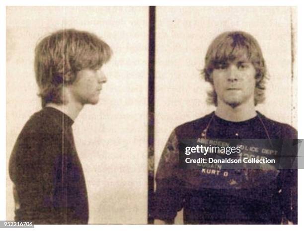 Kurt Cobain in a mug shot after being arrested by Aberdeen, Washington police in May 1986.