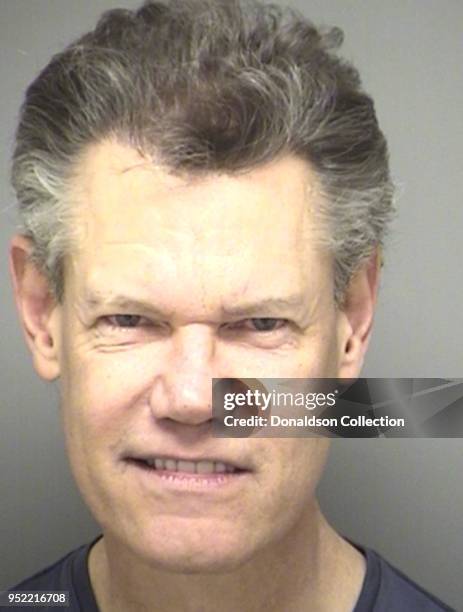 Country singer Randy Travis was arrested by Texas cops in February 2012.