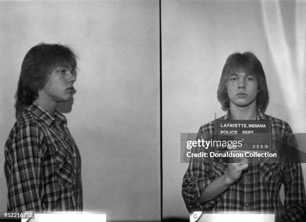 An 18-year-old Axl Rose posed for the above Lafayette, Indiana police mug shot in July 1980.