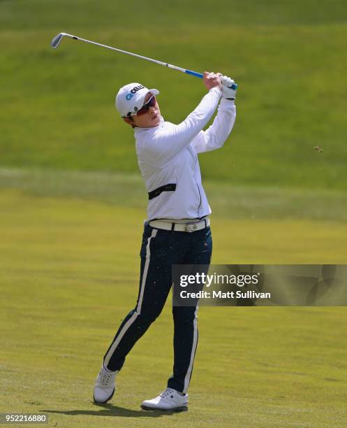 Eun-Hee Ji of South Korea watches her second shot on the 11th hole during the second round of the Mediheal Championship at Lake Merced Golf Club on...