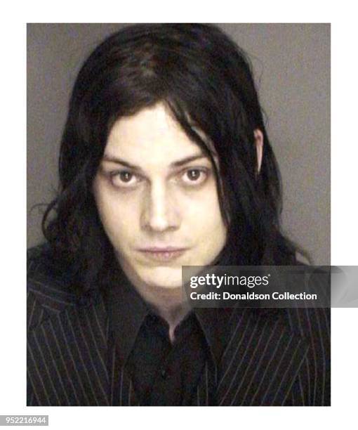 White Stripes frontman Jack White was booked by Detroit cops in December 2003 on an aggravated assault charge.