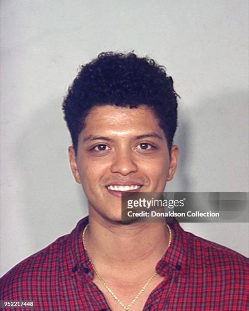 Pop Singer Bruno Mars was arrested by Las Vegas police in September 2010 and charged with narcotics possession.
