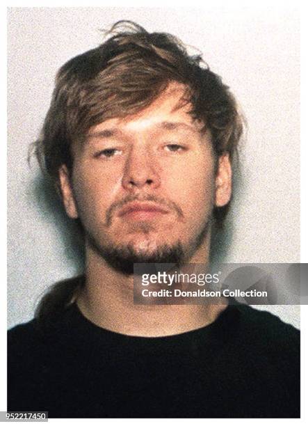 New Kids on the Block member Donnie Wahlberg posed for the above mug shot in March 1991 after Kentucky cops charged him with arson.