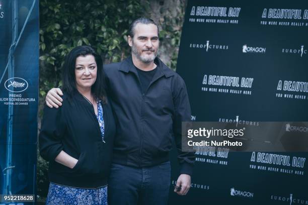 Director Lynne Ramsay and actor Joaquin Phoenix attend 'A Beautiful Day' photocall at Hotel De Russie on April 27, 2018 in Rome, Italy.