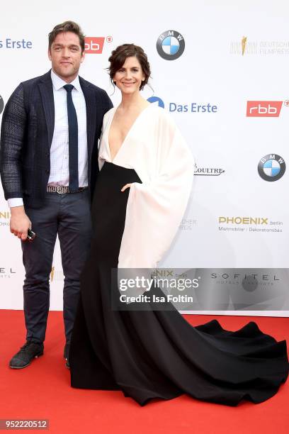 German actors Ronald Zehrfeld and Christina Hecke attend the Lola - German Film Award red carpet at Messe Berlin on April 27, 2018 in Berlin, Germany.