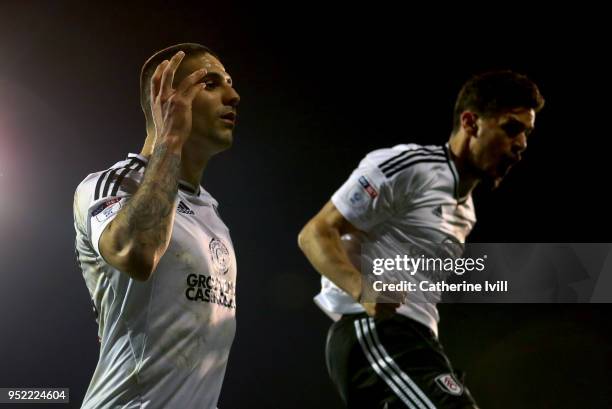 Aleksandar Mitrovic of Fulham celebrates scoring his sides second goal alongside Rui Fonte of Fulham during the Sky Bet Championship match between...