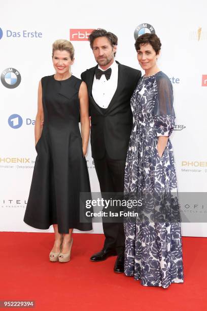Anke Engelke, Benjamin Sadler, Nina Kunzendorf attend the Lola - German Film Award red carpet at Messe Berlin on April 27, 2018 in Berlin, Germany.