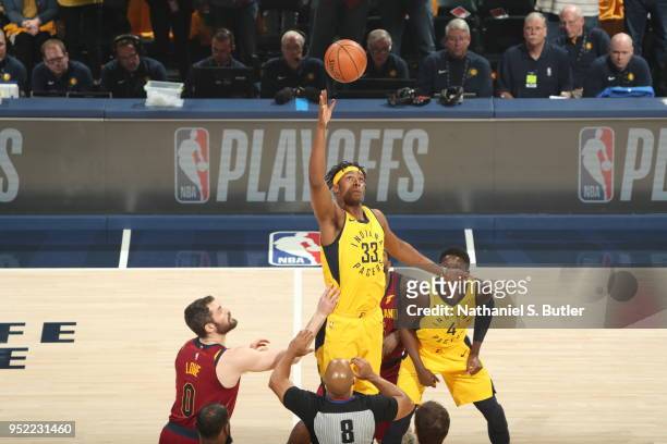 Myles Turner of the Indiana Pacers reaches for the ball against the Cleveland Cavaliers in Game Six of Round One of the 2018 NBA Playoffs on April...