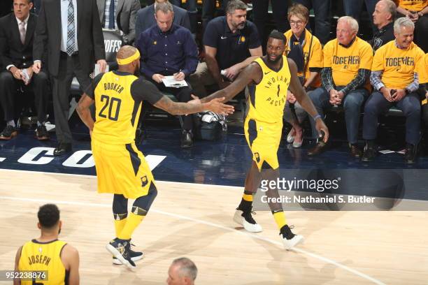 Lance Stephenson of the Indiana Pacers and Trevor Booker of the Indiana Pacers high five during the game against the Cleveland Cavaliers in Game Six...