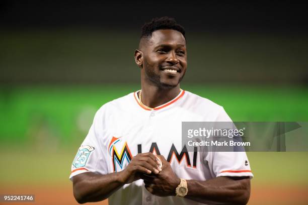 Pittsburg Steelers receiver Antonio Brown throws out the first pitch before the game between the Miami Marlins and the Colorado Rockies at Marlins...