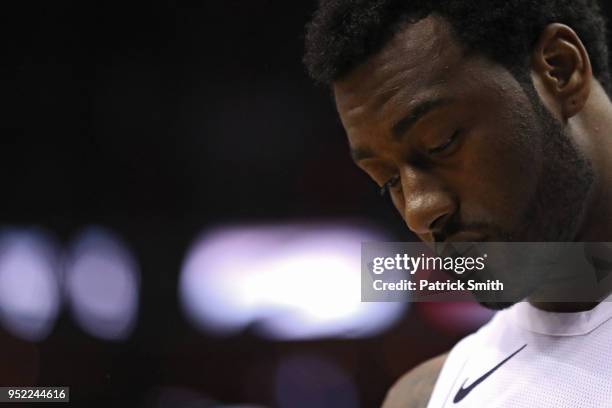 John Wall of the Washington Wizards looks on against the Toronto Raptors in the second half during Game Six of Round One of the 2018 NBA Playoffs at...