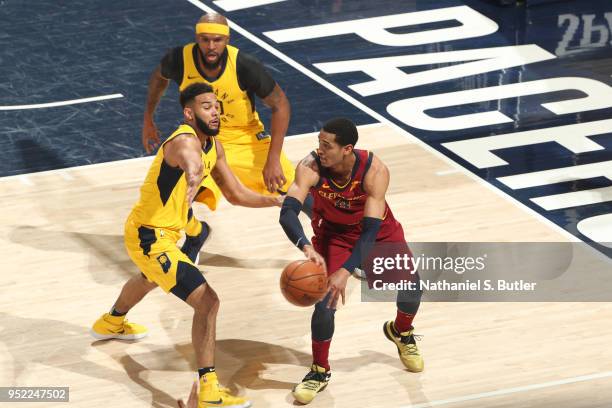 Jordan Clarkson of the Cleveland Cavaliers handles the ball against Cory Joseph of the Indiana Pacers in Game Six of Round One of the 2018 NBA...