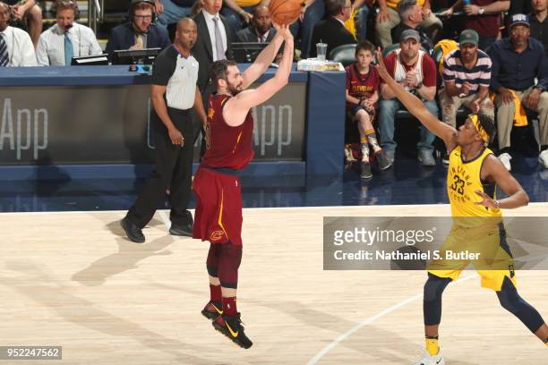 Kevin Love of the Cleveland Cavaliers shoots the ball against Myles Turner of the Indiana Pacers in Game Six of Round One of the 2018 NBA Playoffs on...