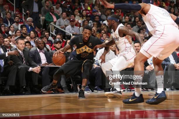 Delon Wright of the Toronto Raptors handles the ball against the Washington Wizards in Game Six of the Eastern Conference Quarterfinals during the...