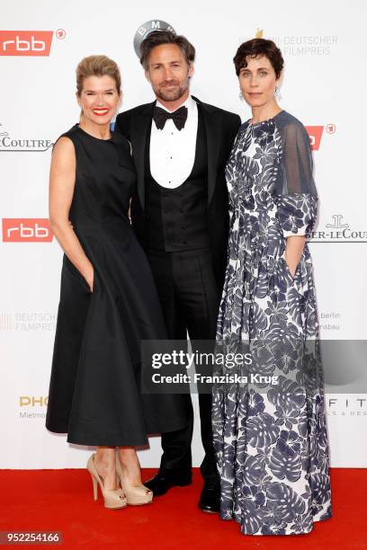 Anke Engelke, Benjamin Sadler and Nina Kunzendorf attend the Lola - German Film Award red carpet at Messe Berlin on April 27, 2018 in Berlin, Germany.